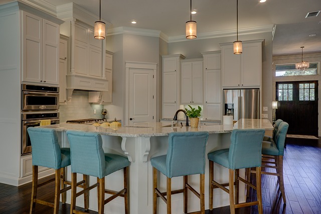 Kitchen layout planning with island seating and cabinet storage